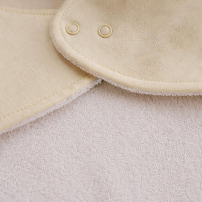 Beige aviation baby bandana bib, reverse side fabric detail