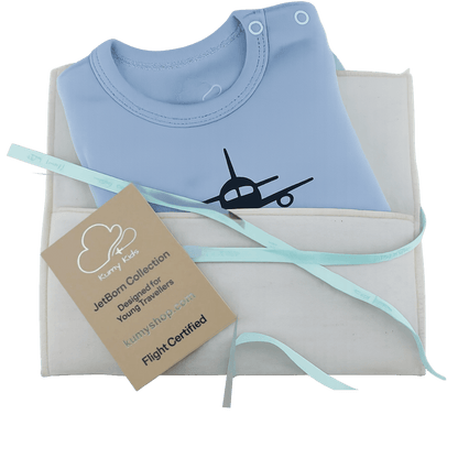 Light blue baby onesie with airplane design on a white box, featuring a Kummy Kids tag.