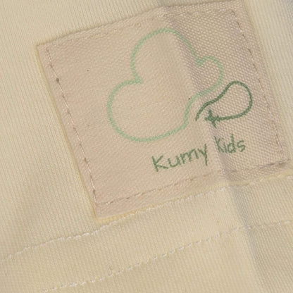 Beige aviation baby bodysuit, sleeve and label detail