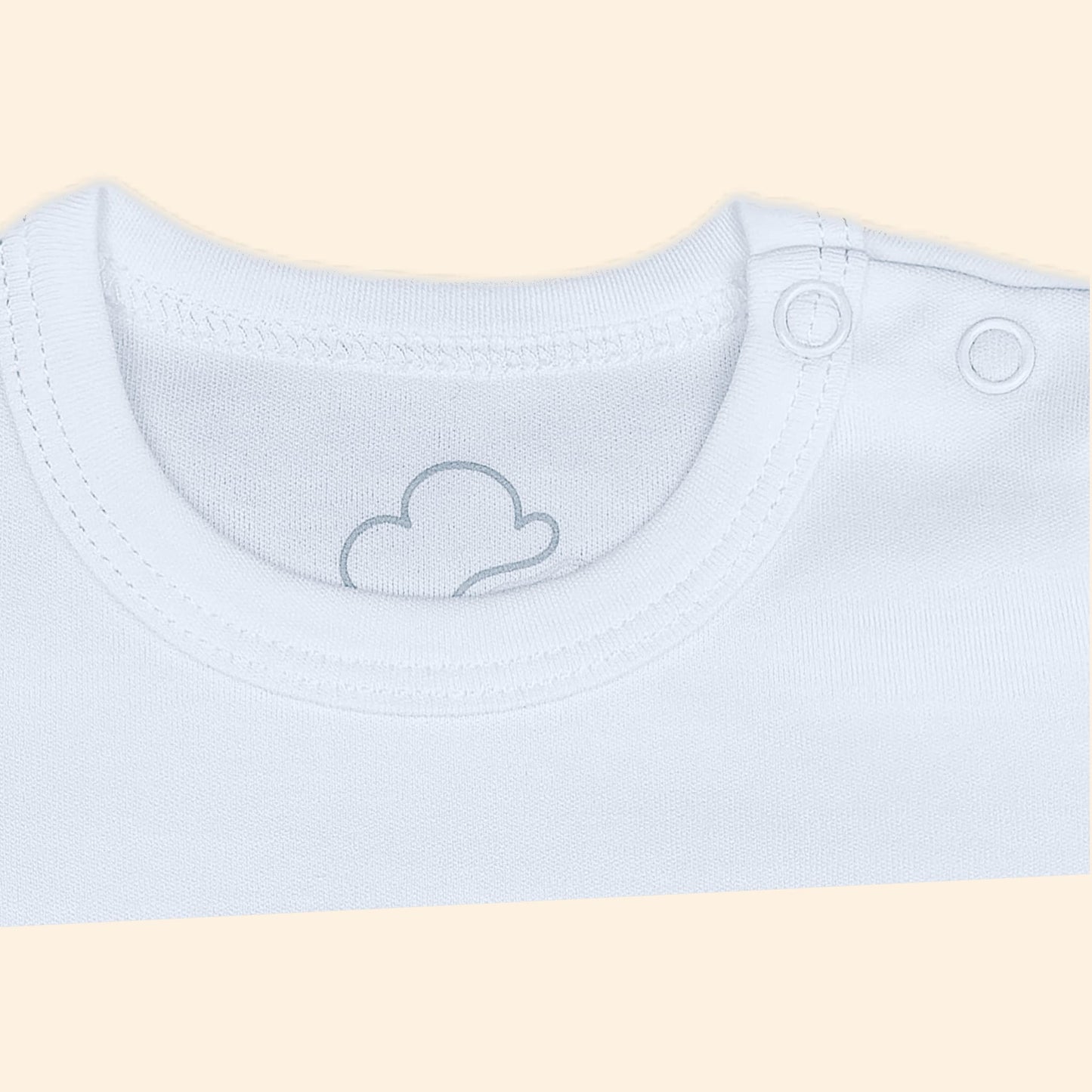 Ivory short sleeve baby bodysuit neck detail with soft newborn fabric finish